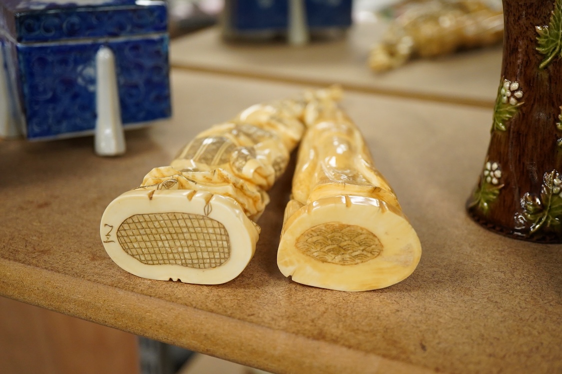 Two early 20th century Japanese walrus ivory carvings, 26cm
